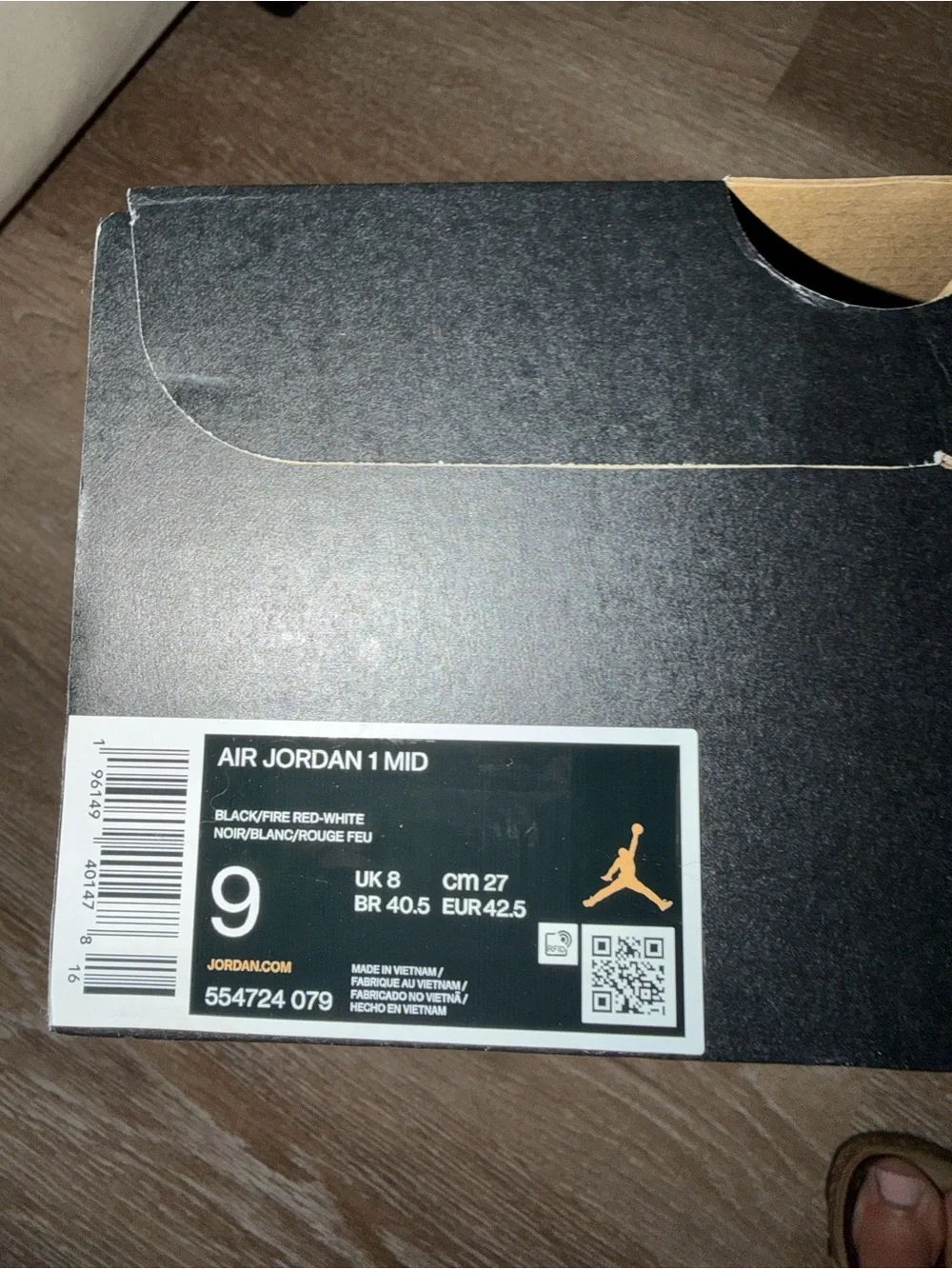 Jordan Men's Black and Gray High-Top Sneakers with Subtle Pink Accents